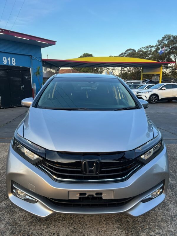 "2019 Honda Shuttle Hybrid, silver exterior, advanced hybrid technology, spacious interior, Honda Sensing safety features, touchscreen infotainment, reverse camera, available at Umer Motors Villawood