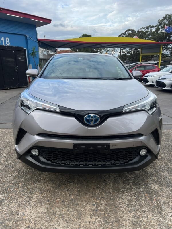 2017 Toyota C-HR Hybrid, stylish and efficient SUV, low mileage, blind spot monitor, heated leather seats, reverse camera, Apple CarPlay, available at Umer Motors Villawood.